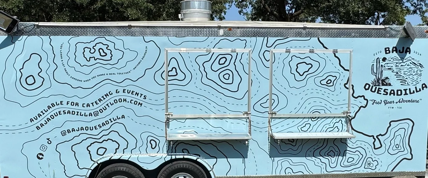 Baja Quesadilla food trailer wrapped in a pale blue topographic pattern